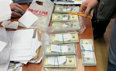 НАБУ провело обыски в Офисе генпрокурора по делу о взятке и мошенничестве. Изъят большой объем наличных /Фото 1