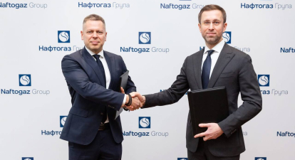 Член правління ПриватБанку з питань корпоративного та малого і середнього бізнесу Євген Заіграєв та голова правління НАК «Нафтогаз України» Сергій Корецький /Getty Images