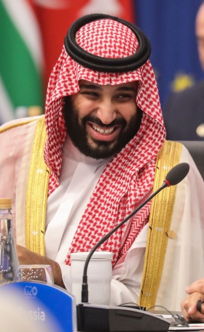 Мухаммед ибн Салман Аль Сауд,  наследный принц Саудовской Аравии и Владимир Путин. /Getty Images