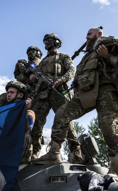 Члени Добровольчого російського корпусу біля російського кордону на півночі України /Getty Images