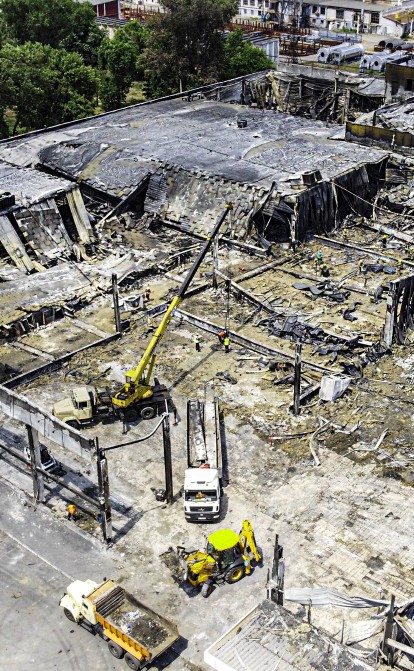 Зруйнований росіянами ТЦ «Амстор» у Кременчуці. /Getty Images