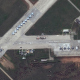 Спутниковый снимок авиабазы в Саках в Крыму, где можно насчитать 26 истребителей, 16 апреля 2022 года. /MAXAR TECHNOLOGIES