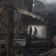 Пожарные работают над тушением пожара в доме после атаки россиян в Харькове, Украина, понедельник, 11 апреля 2022 года. (AP Photo/Felipe Dana) /AP